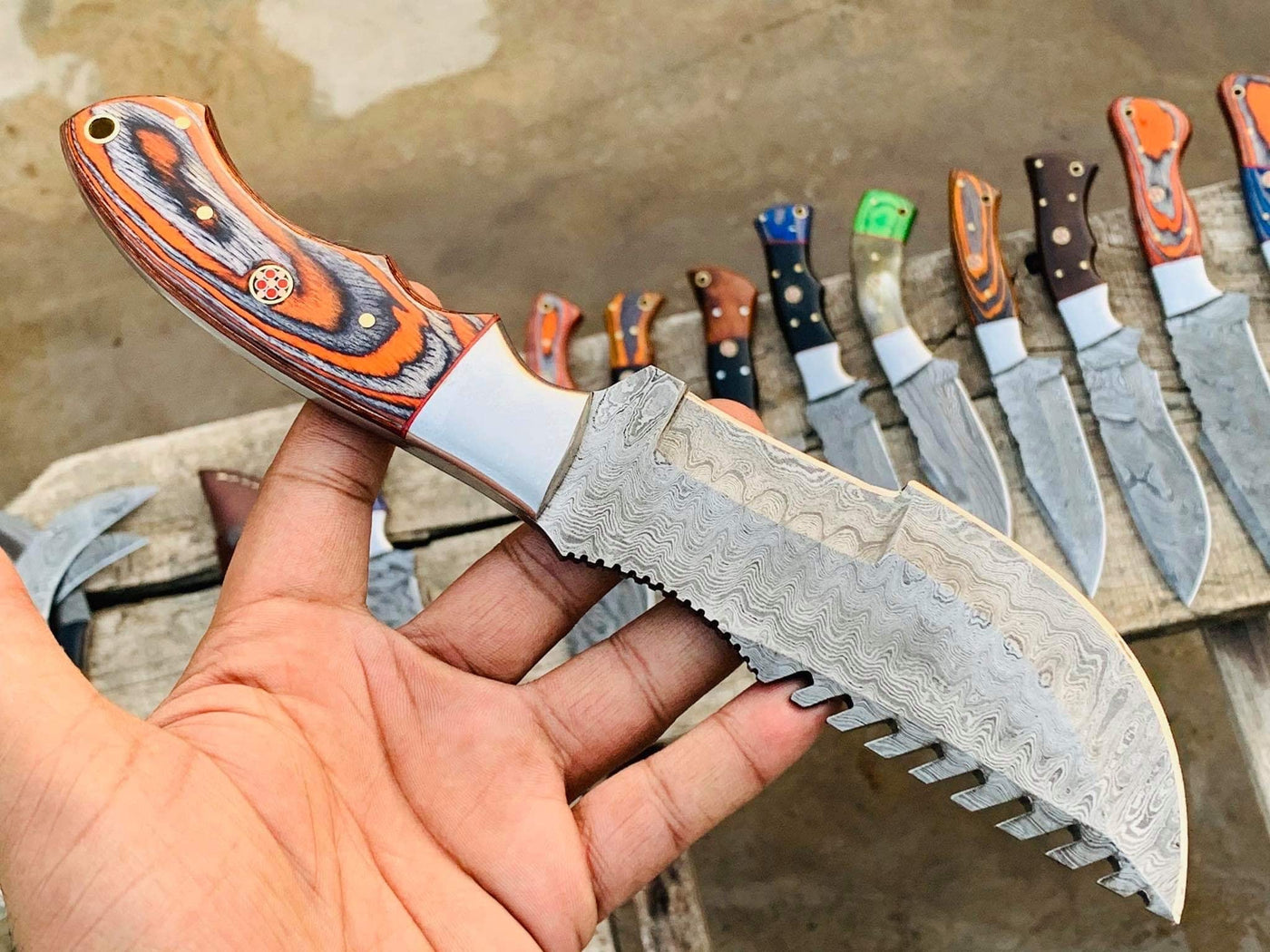 Deal if two knives with orange leather sheathes - Troy Blades